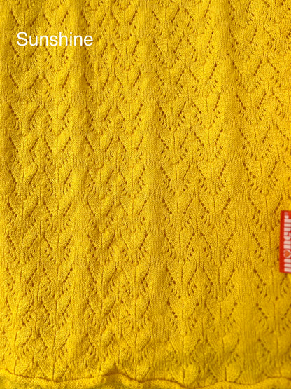 close up of sunshine colour way lace wrap moncur knitwear