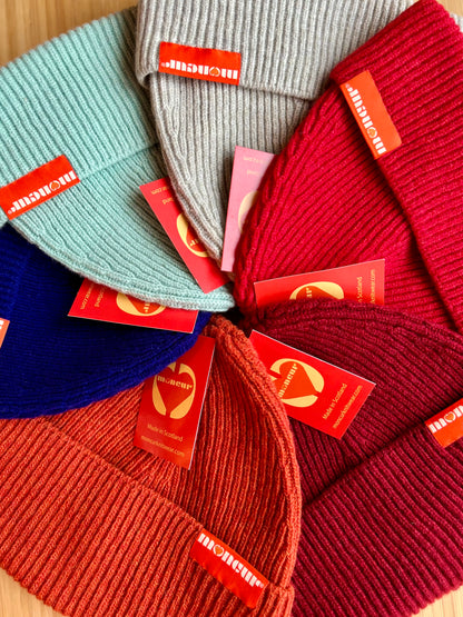 variety of colours ranging from warm reds and oranges to intense cobalt blue and then to softer mint and natural