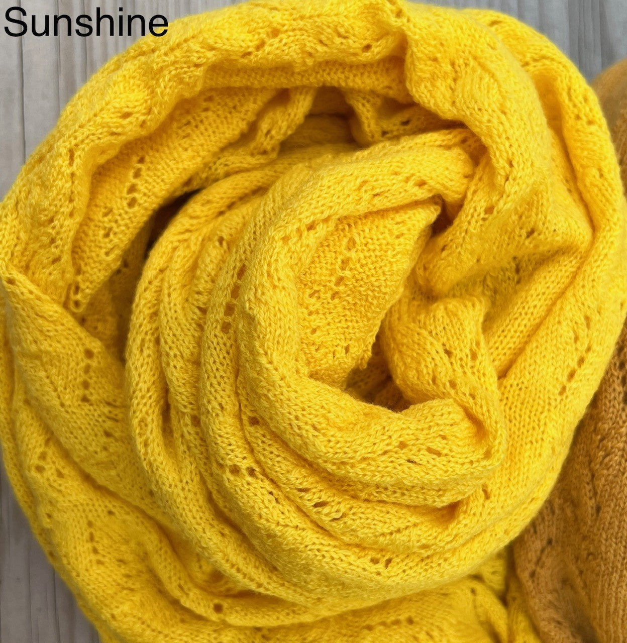 close up shot of sunshine lace wrap moncur knitwear cashmere 